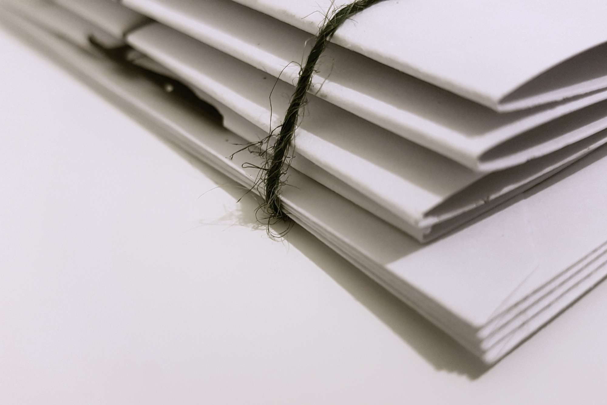 Policies & Procedures A pile of documents to represent the policies and procedures that Azilo Training abides by to provide high standards of training.